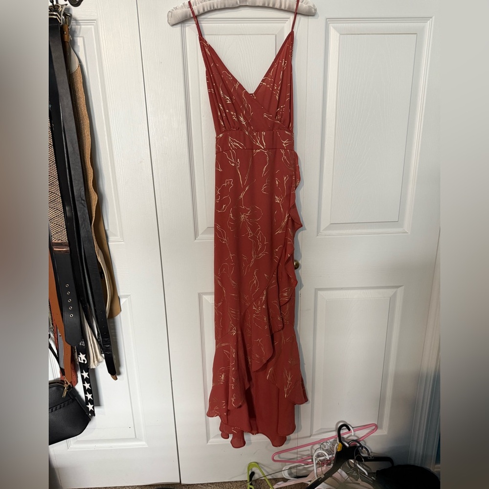 Elegant Rust Colored Dress with Gold Accents